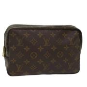 Pre-owned Brunt lerret Louis Vuitton toalettmappe