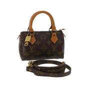 Pre-owned Brunt lerret Louis Vuitton veske