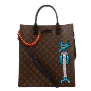 Pre-owned Brunt lerret Louis Vuitton Sac Flat