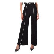 Stilige svarte bukser med elastisk linning og splitter