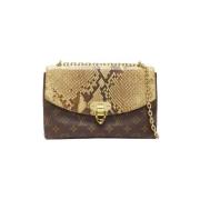 Pre-owned Brunt lerret Louis Vuitton skuldervesker