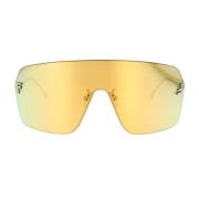 Moderne skjold solbriller med gull metallarmer og speilgull linse