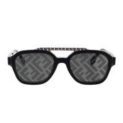 Glamorøse geometriske solbriller med svart acetatramme og grå linser