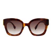 Glamorøse solbriller med Havana-ramme og gradientlinser