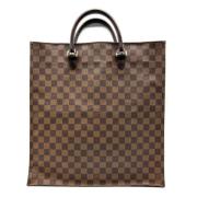 Pre-owned Brunt lerret Louis Vuitton Sac Flat