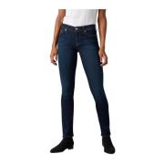 Bair skyllet indigo midt stigende Roxanne -jeans