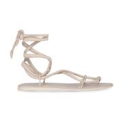 Beige flat snøresandal