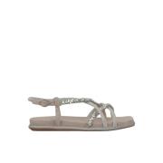 Flat sandal med kryssrem