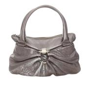 Pre-owned Fabric handbags