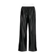 Sorte track pants med integrert truse og stablet Wang-puff