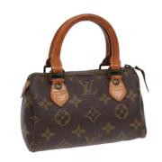 Pre-owned Canvas handbags