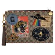 Pre-owned Canvas clutches