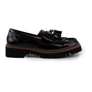 Sort skinn slip-on frynse loafers