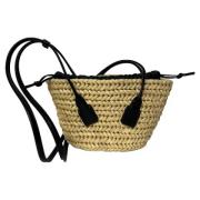 Pre-owned Raffia handbags