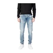 Tapered Cotton-Blend Jeans