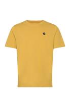 Loke Badge Tee - Regenerative Organ Yellow Knowledge Cotton Apparel